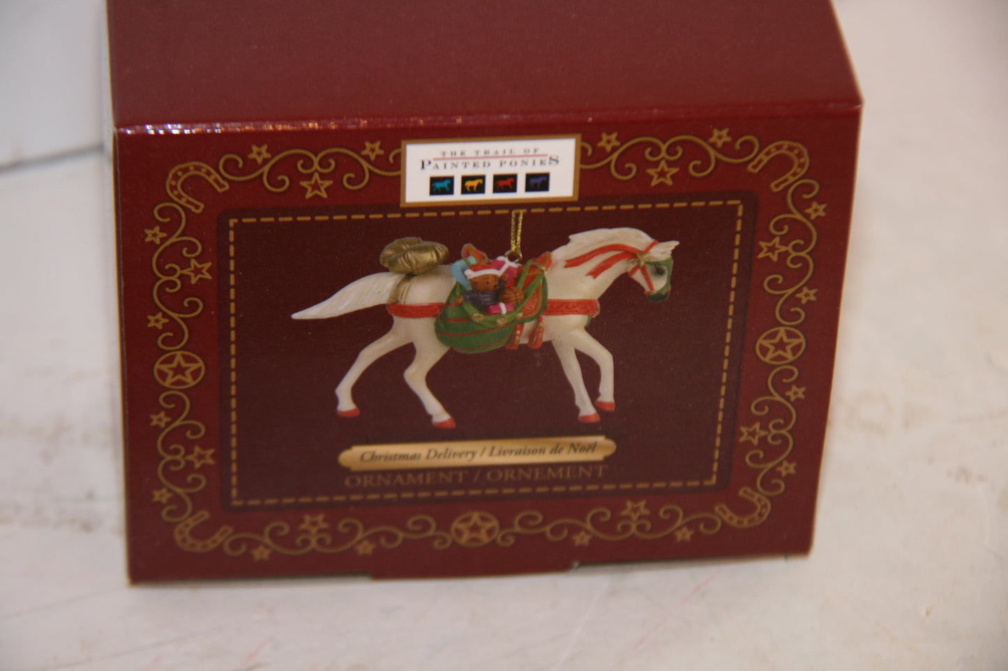 Enesco The Trail of Painted Ponies Christmas Delivery Ornament